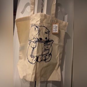 NWT Brandy💖Melville Ivory canvas bag printed with the Puss In Boots graphic